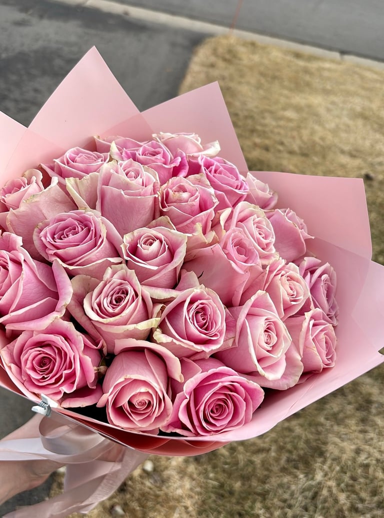 Pink roses in pink floral paper